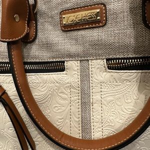 One Jose Hess handbag and one Brighton handbag in No wear. Price is $40 each.